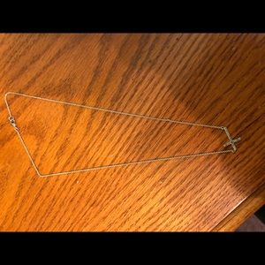 Silver sideways cross necklace